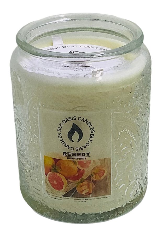 Remedy Luxe Candle in a 8 ounce glass vessel.  Scent is a strong, hit pleasant, fresh, tangy grapefruit aroma.